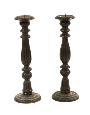 Lot 1597 - A pair of modern pricket candlesticks