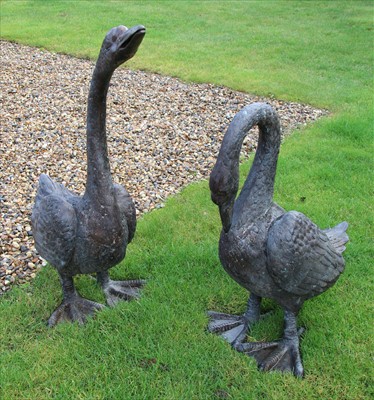 Lot 655 - Two case bronze swans