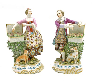 Lot 137 - A pair of 19th Century English porcelain figures