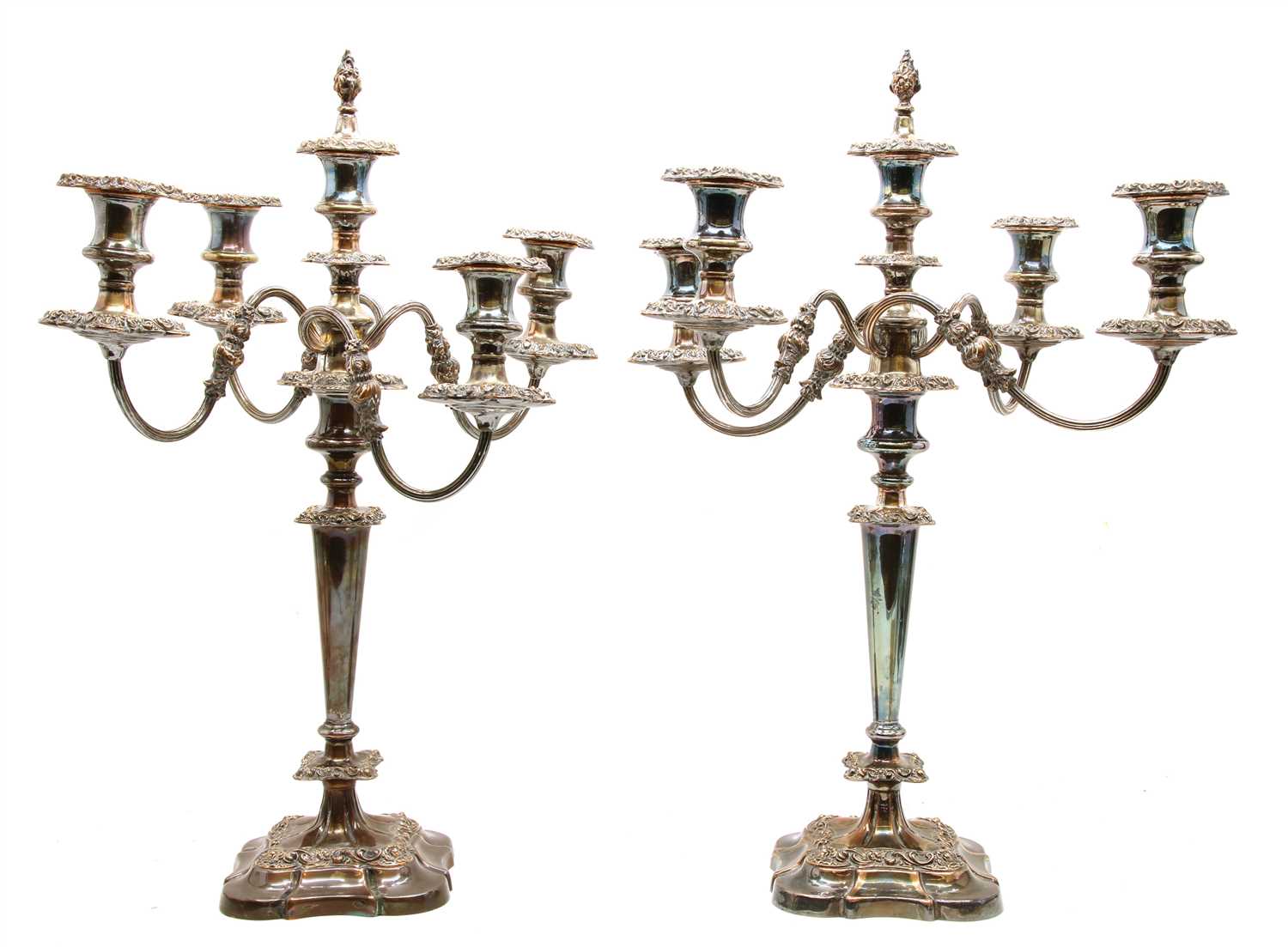 Lot 1134 - A pair of silver plated four branch candelabra