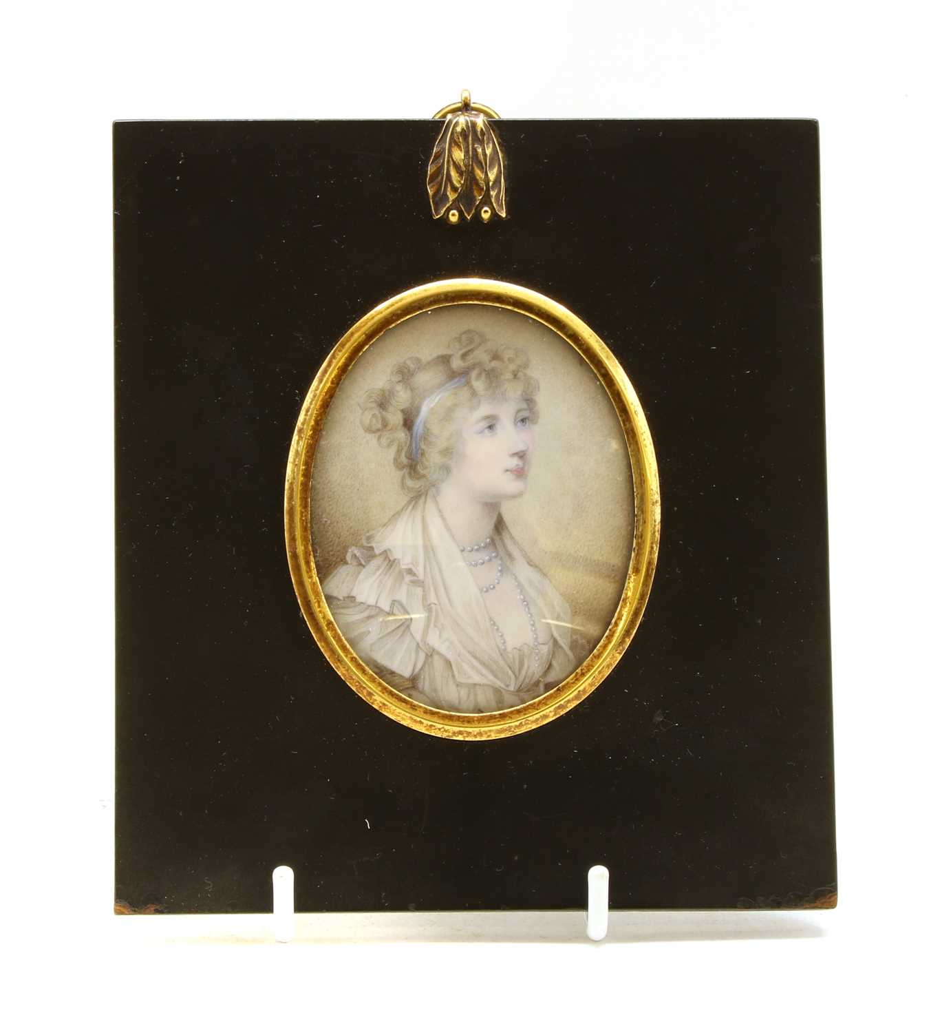 Lot 97 - A George III miniature painting of a lady