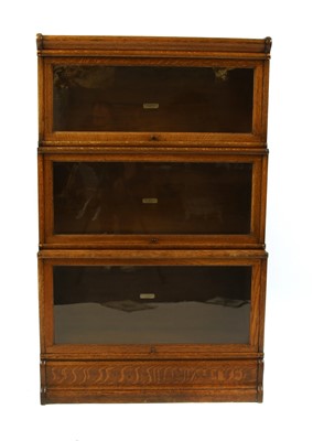 Lot 1741 - A Globe Wernike oak bookcase