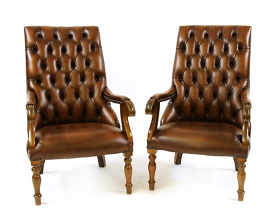 Lot 1710 - A pair of brown buttonback Carlton armchairs