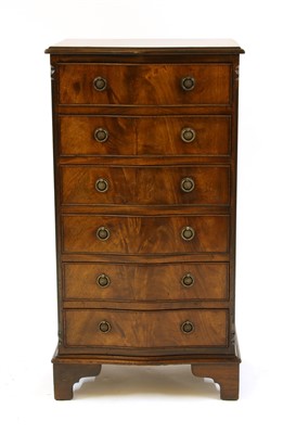 Lot 1734 - An early 20th century serpentine front narrow chest of drawers