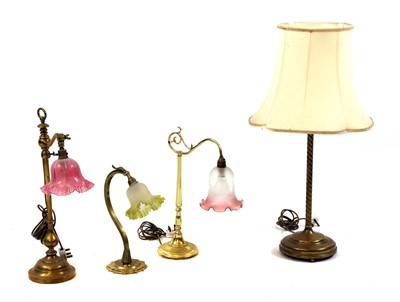 Lot 1476 - Four brass table lamps