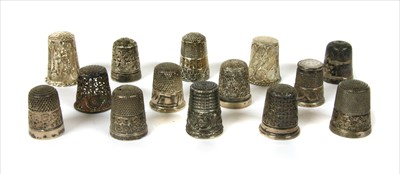 Lot 195 - A collection of 14 thimbles