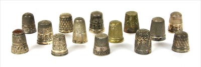 Lot 201 - A collection of 14 thimbles