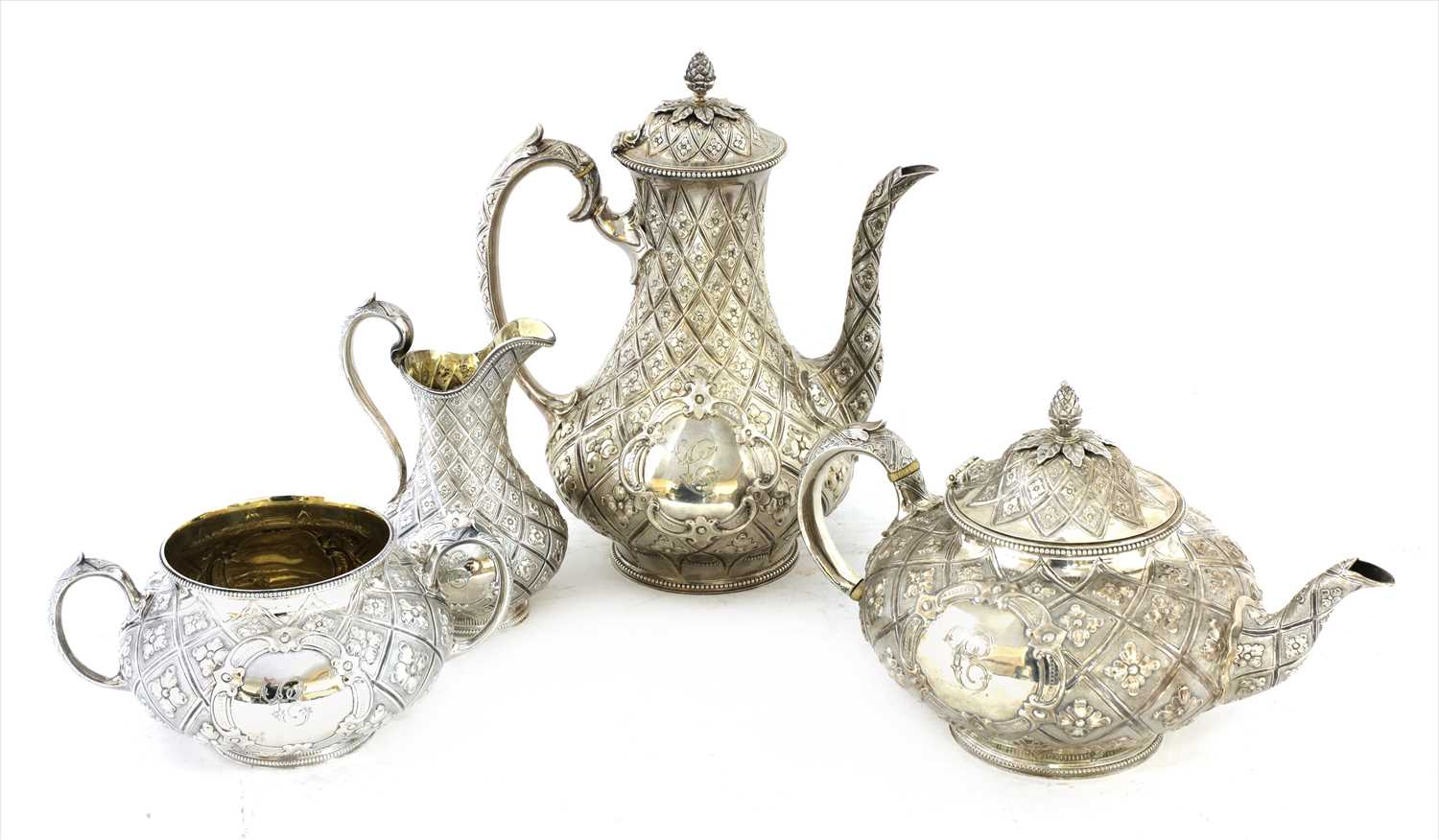 Lot 65 - A silver four-piece tea set