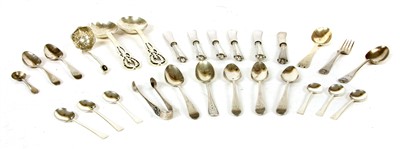 Lot 1135 - A pair of planished silver serving spoons