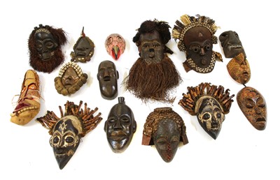 Lot 1418 - A large collection of African tribal masks