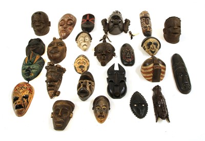 Lot 1719 - A large collection of African tribal masks