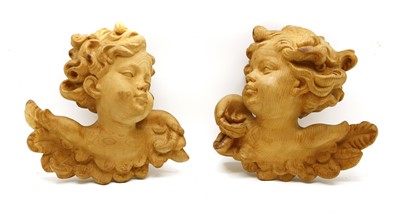 Lot 1415A - A pair of carved wooden heads