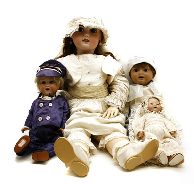 Lot 1214 - A collection of dolls