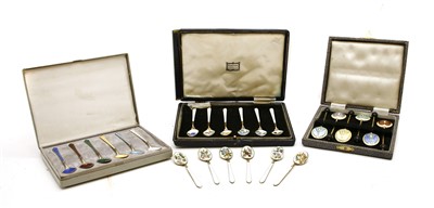 Lot 1104 - A set of twelve silver gilt and enamel coffee spoons