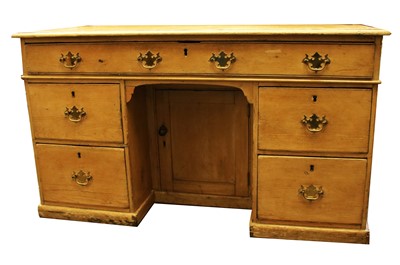 Lot 1587 - A Victorian stripped pine twin pedestal desk