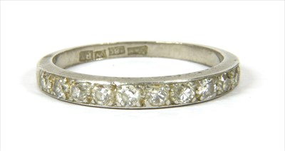 Lot 31 - A diamond half eternity ring