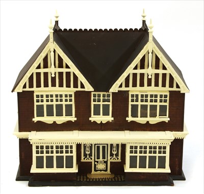 Lot 512 - An Edwardian white painted double fronted dolls house