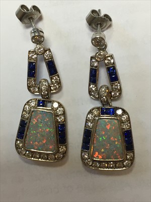 Lot 41 - A pair of white gold opal, diamond and sapphire drop earrings
