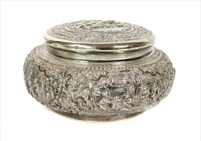Lot 75 - An Indian circular silver box and cover