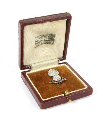 Lot 23 - A 9ct gold and platinum, diamond and enamel Royal Engineers military sweetheart brooch