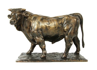 Lot 737 - A patinated bronze figure of a bull
