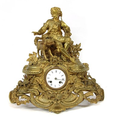 Lot 454 - A gilt metal mantel clock