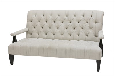Lot 739 - A modern Andrew Martin design open arm sofa