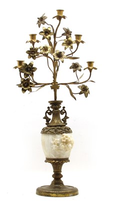 Lot 145 - A gilt metal and alabaster candlestick vase
