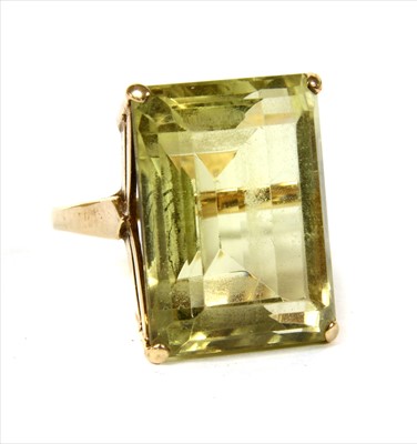 Lot 57 - A gold single stone citrine ring
