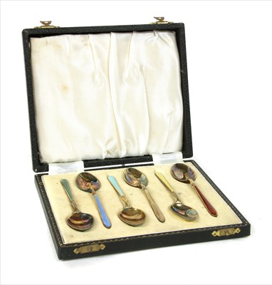 Lot 37 - A cased set of six silver and enamel coffee spoons