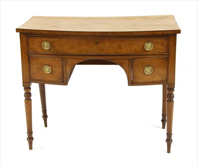 Lot 435 - A Regency bow front dressing table