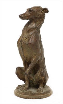Lot 112 - A cast iron figure of a seated whippet