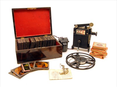 Lot 465 - A collection of cased 19th century coloured glass lantern slides