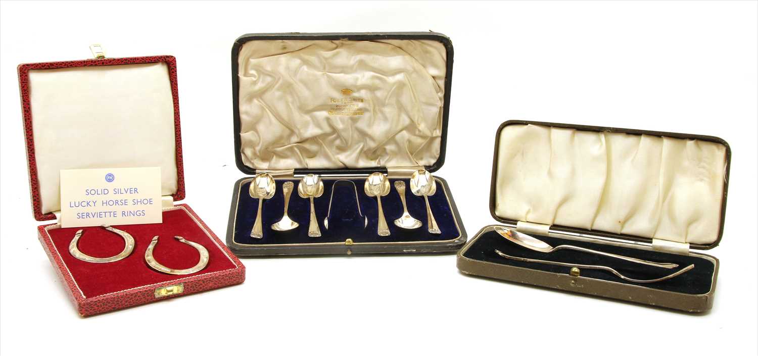 Lot 33 - A cased set of novelty silver napkin rings