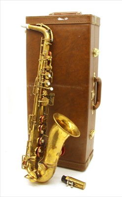Lot 517 - A brass saxophone