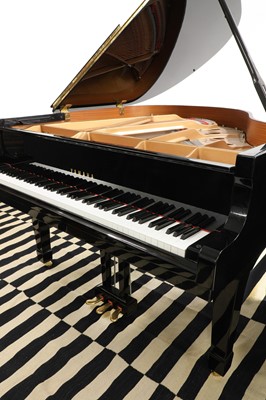 Lot 701 - An ebonised Yamaha C1 grand piano