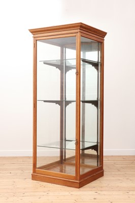 Lot 611 - A golden oak glazed display cabinet