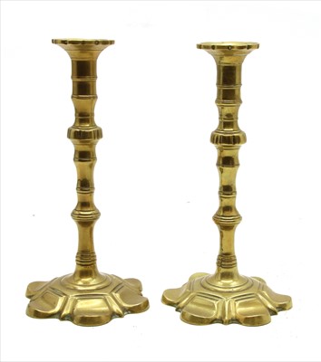 Lot 489 - A pair of brass candlesticks