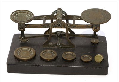 Lot 1120 - A set of brass postal scales