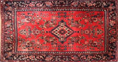 Lot 777 - Two red ground hamadan carpets