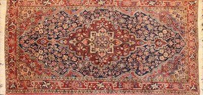 Lot 553A - An oatmeal blue ground Jozan carpet
