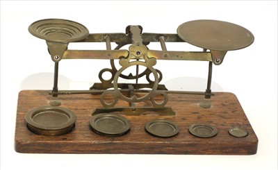 Lot 1122 - A large set of brass postal scales