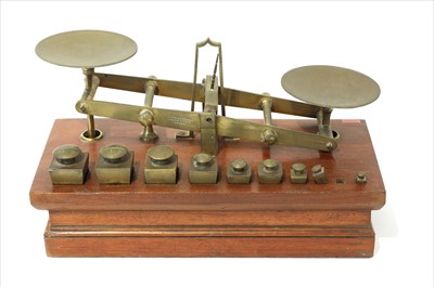 Lot 1125 - A set of brass roberval postal scales
