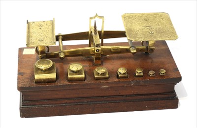 Lot 1126 - A set of brass roberval postal scales