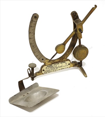 Lot 1130 - A brass pendulum-type scale