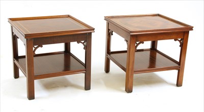 Lot 685 - A pair of mahogany and inlaid two tier square occasional tables