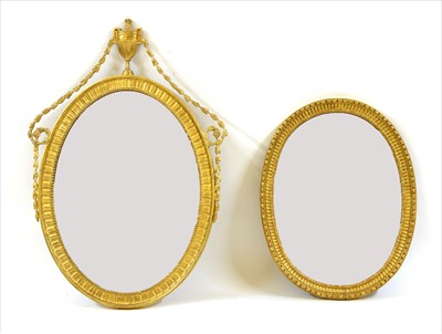 Lot 728 - A neo-classical style oval wall mirror