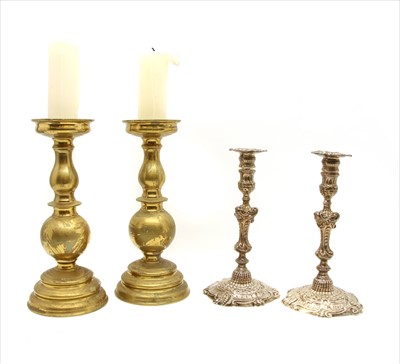 Lot 192 - A pair of brass pricket candlesticks