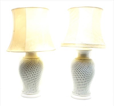 Lot 455 - Two modern white pottery table lamps and shades