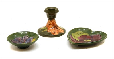 Lot 577 - A Moorcroft Hibiscus candlestick